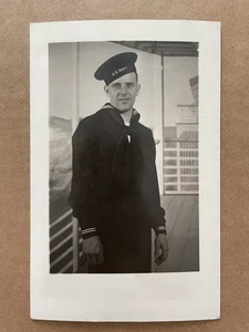 Vintage RPPC Sailor US NAVY posing Carnival Fair Ship Backdrop AL BERRY ID'd - Picture 1 of 3