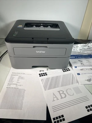 Impresora láser monocromática Brother HL-L2300D con tóner de repuesto y caja Foto 1 de 4