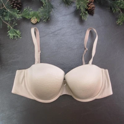 Sujetador para mujer Victorias Secret 38C nude forrado sin tirantes convertible push up Foto 1 de 4