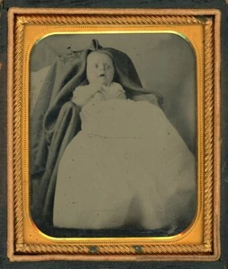 BABY WITH SURPRISED STARTLED LOOK WITH OPEN EYES IN WHITE DRESS HIDDEN MOTHER? - Picture 1 of 1