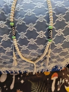 Long cream colored natural beads unknown with green and black beads. with fringe - Picture 1 of 5