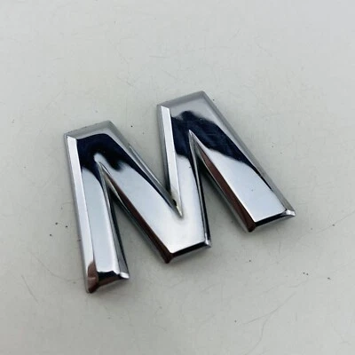 Nissan Máxima 2004-2008 emblema logotipo letra insignia maletero trasero cromado OEM E61M-2 Foto 1 de 4