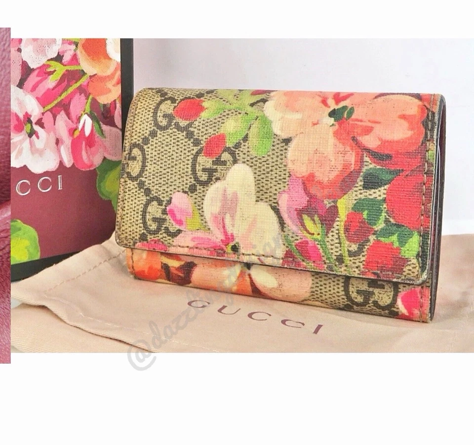 Auténtico estuche porta llaves GUCCI marrón GG PVC flores estampado floral Foto 1 de 4