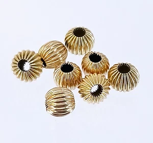 1 Pc. Fluted 10k Yellow Gold Charm Spacer BEAD 2mm Hole 4mm x 5mm Oval - Picture 1 of 4