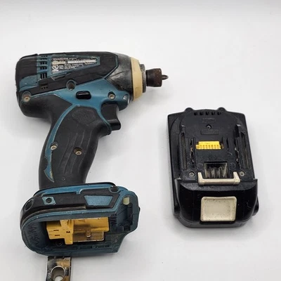 Herramienta atornillador de impacto Makita LXDT04 18V con batería BL1815 probada Foto 1 de 4