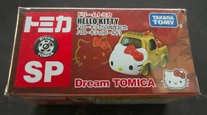 Takara Tomy Dream Tomica No. SP Hello Kitty 50th Anniversary Gold Toy Car - Picture 1 of 6