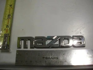 MAZDA CHROME LETTERS EMBLEM SYMBOL USED BAGDE OEM ORIGINAL - Picture 1 of 1