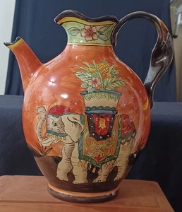 Nuova brocca in ceramica dipinta a mano design elefante Indie occidentali con manico ritorto - Foto 1 di 12