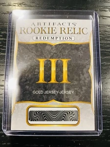 Camiseta deportiva reliquia dorada 2024-25 Upper Deck Artifacts III ROOKIE REDEMPTION - Imagen 1 de 2