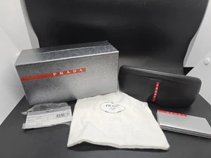 Prada Sonnenbrille Etui nur schwarz Kunststoff Flip-Top mit Box und Staubbeutel Papiere - Bild 1 von 16