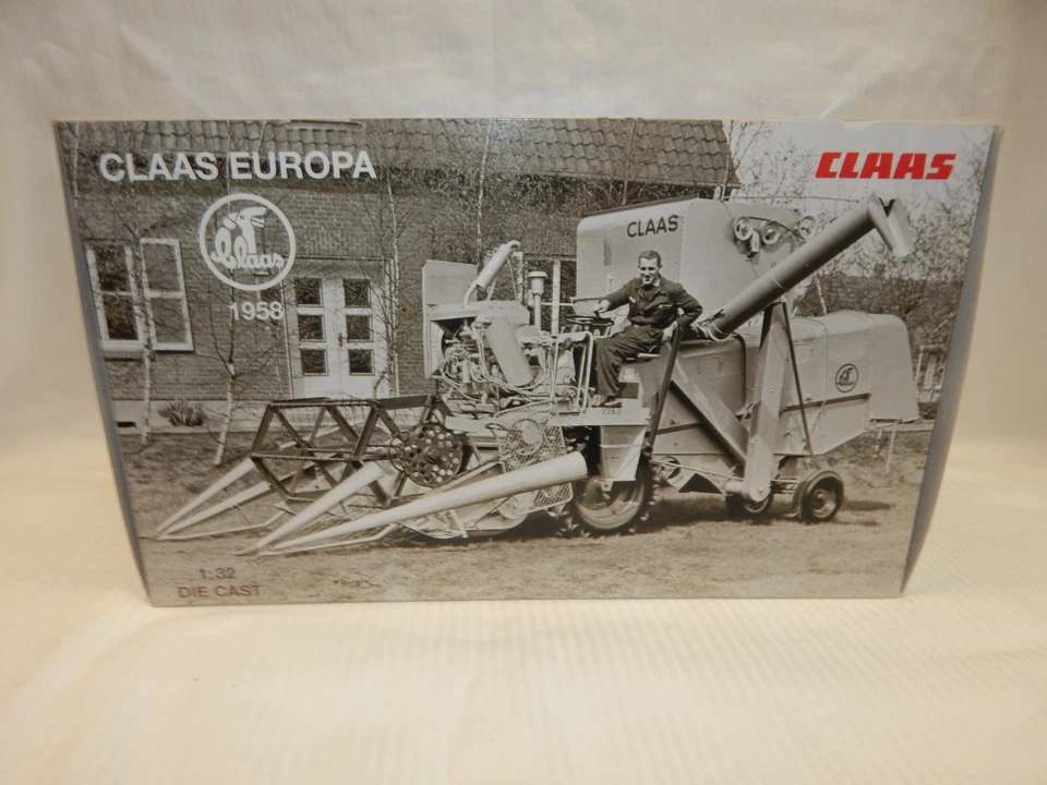UNIVERSAL HOBBIES CLAAS EUROPA COMBINE 246 220.0 DEALER ISSUE MIB  1:32 SCARCE - Image 1 of 4