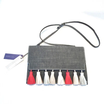 NUEVO Cartera sin asas cruzada Rebecca Minkoff Sofia de mezclilla oscura con múltiples borlas Foto 1 de 4