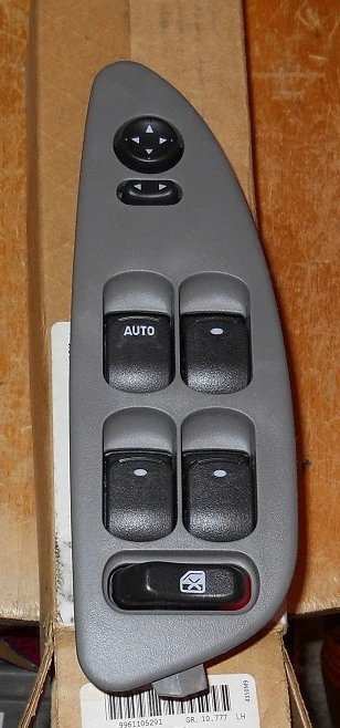 Interruptor de bloqueo de puerta de ventana eléctrica LH Chevrolet Malibu 2004-05 nuevo de lote Foto 1 de 1