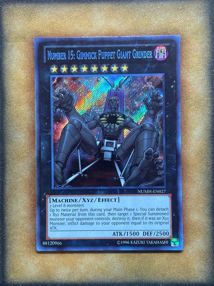 Yugioh Number 15: Gimmick Puppet Giant Grinder NUMH-EN027 Secret Rare NM - Image 1 of 1