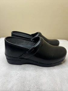 Zuecos de trabajo Dansko para mujer 39 EE. UU. 8,5 - 9 cuero negro sin cordones - Imagen 1 de 15
