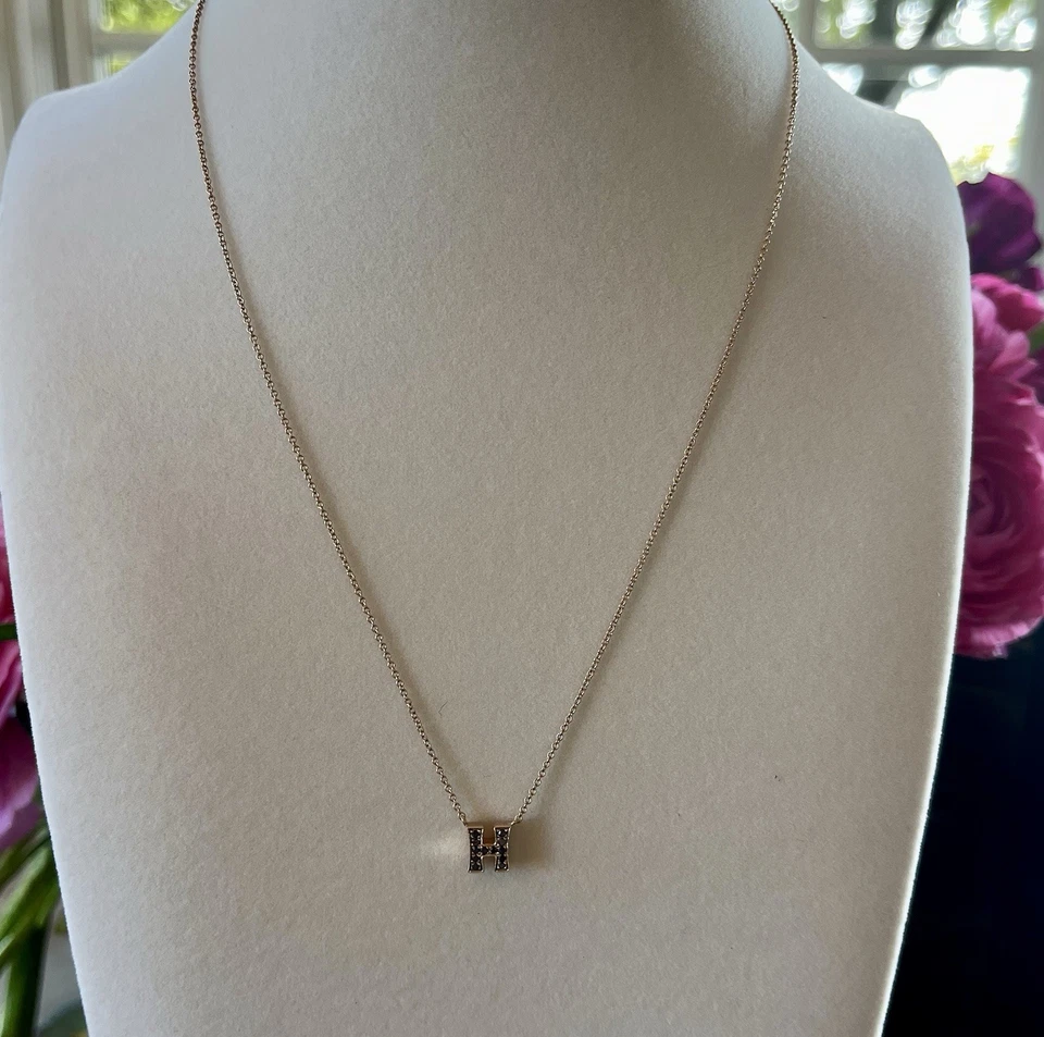 Collar de diamantes negros con letras "H", oro rosa de 14K e Italia estampada: usado Foto 1 de 4