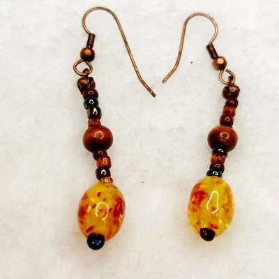 Pendientes de cobre hechos a mano cuentas ámbar cuentas de madera cuentas de vidrio colgantes Foto 1 de 4