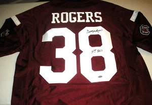 MAGLIA GEORGE ROGERS SC COCKS SCHWARTZ/COA FIRMATA UFFICIALE CON LICENZA UNDER ARMOUR - Foto 1 di 2