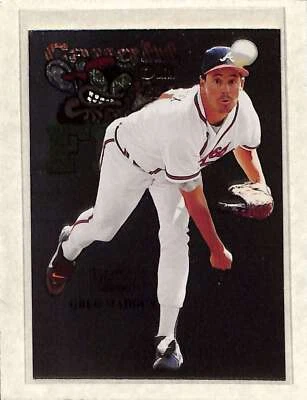 1999 Skybox Metal Universe #243 Greg Maddux Caught on the Fly NM - Image 1 of 2