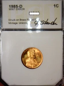 1985d FEHLER AUF MESSING GESCHLAGEN Brett aus Metall Lincoln Cent HERVORRAGENDE EDELSTEIN BU + Münze - Bild 1 von 6