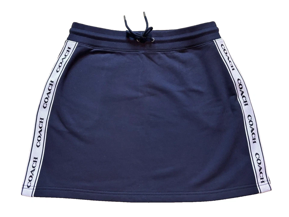 Minifalda de tenis Coach azul marino y blanco náutica línea A con cordón logotipo L Foto 1 de 4