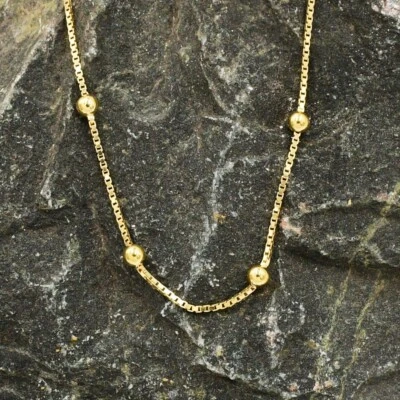 Collar de eslabones de cadena de bola y caja italiana Unoaerre de oro amarillo de 18 quilates de 27 1/2" de largo Foto 1 de 4