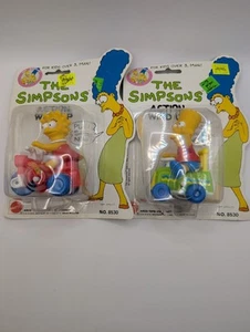 THE SIMPSONS 1990 ACTION WIND UP BART & LISA -- NUOVO CON SCATOLA!!!! - Foto 1 di 6