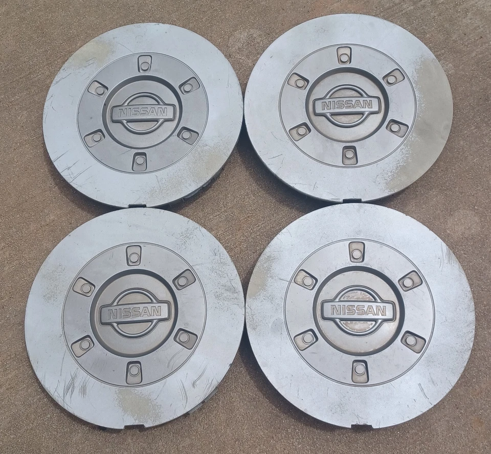 Nissan Maxima center cap set of 4, 2000-2001 part number 40315-2Y910 - Image 1 of 3