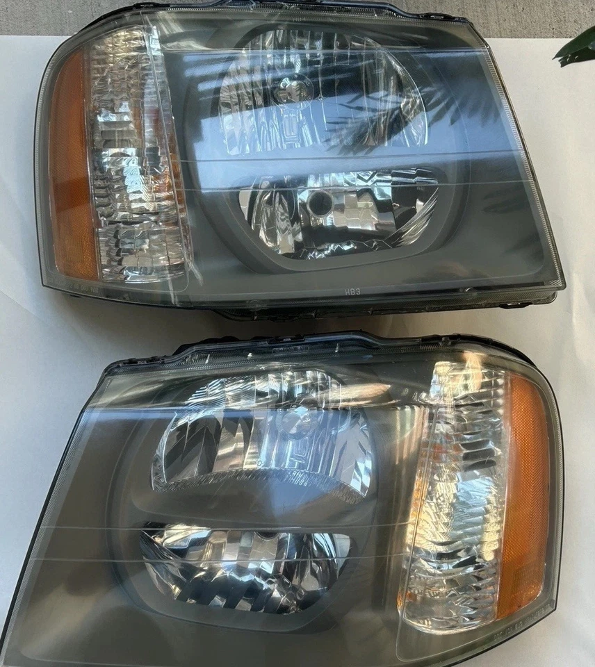 Conjuntos de faros Isuzu Ascender/GMC Envoy izquierda y derecha Foto 1 de 4