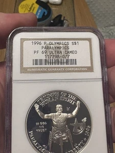 1996 P Olympic Paralympic Commemorative Silver Dollar, PF69 UCAM NGC Brown Label - Picture 1 of 5