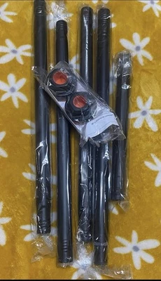 Adjustable black tension shower rod up to 79 inches long - Image 1 of 2