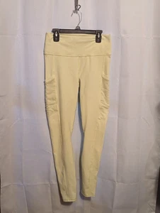 Leggings Fabletics Powerhold amarillo claro para mujer talla pequeña con bolsillos laterales - Imagen 1 de 16