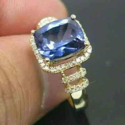 Anillo de compromiso con halo de tanzanita de corte cojín de 2 quilates acabado en oro amarillo de 14 quilates Foto 1 de 4