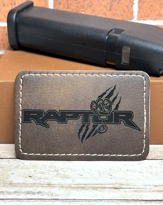 Brown Leatherette Raptor Bronco Patch Iron on Adhesive for Hats, Bag, Clothing - Image 1 of 4