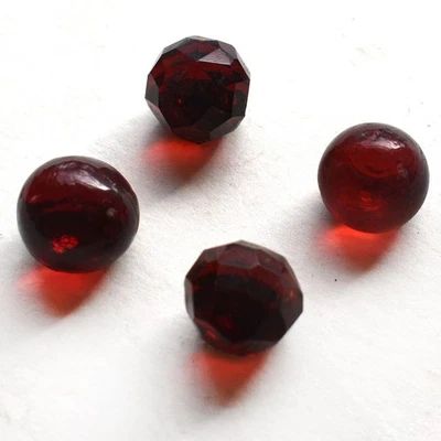 Lot of 4 Small Antique Red Glass Ball Buttons Faceted & Swirl Backs 7/16” - Image 1 of 4