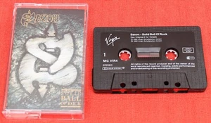 SAXON - UK CASSETTE TAPE - SOLID BALL OF ROCK - Picture 1 of 4