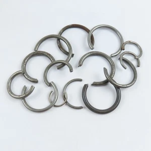 Clockmaker’s Assortment of Steel Mainspring Clamps - Picture 1 of 6