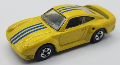 Porsche 959 Automagic 1987 vintage Hot Wheels lavado de autos pared negra amarillo  Foto 1 de 4