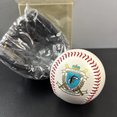 FLORIDA MARLINS FAMILY CREST INAUGURAL SEASON BASEBALL WITH MINI LEATHER GLOVE - Image 1 of 4