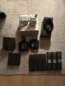 Assorted tv remotes, cable boxes, and router boxes. Roger’s, Telus. READ DESC - Picture 1 of 25