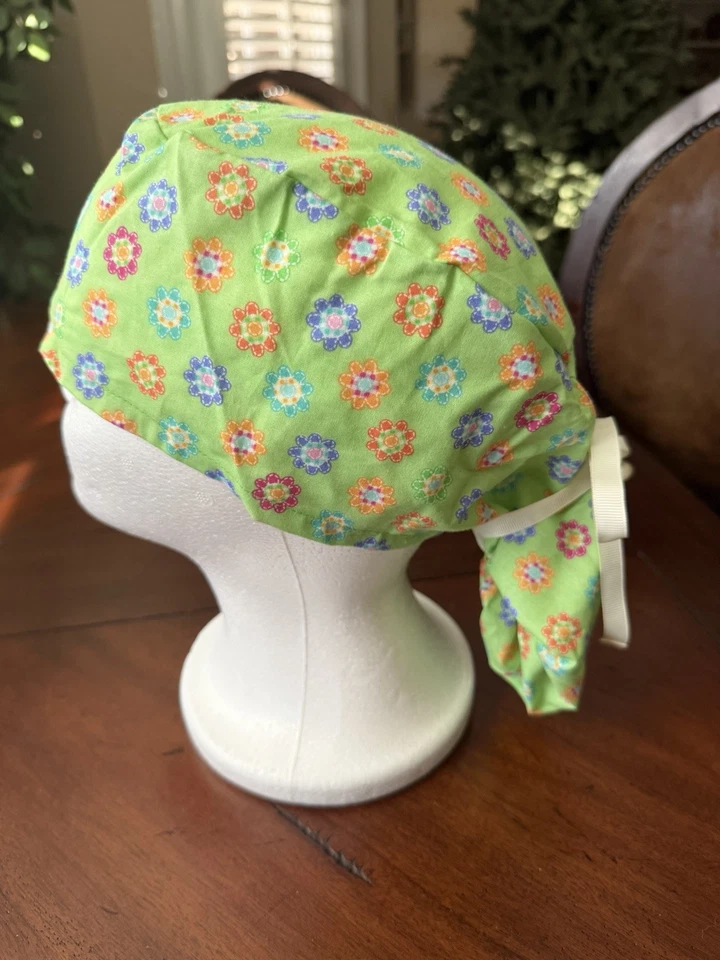 Green With Multicolor Round Designs Ponytail Scrub Hat - Image 1 of 1