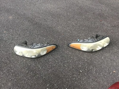 Faros halógenos izquierdo+derecho Buick Lesabre 2000 a 2005 LEER Foto 1 de 4