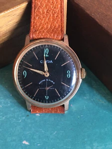Vintage Ancienne Montre Bracelet Homme Mécanique CLYDA Plaqué Or Cadran Noir - Foto 1 di 5
