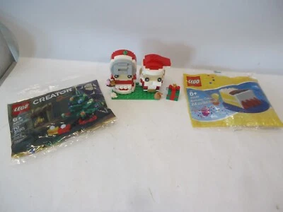 LEGO Brick Headz Mr & Mrs Claus 40274 con árbol de Navidad y pastel de cumpleaños Foto 1 de 4