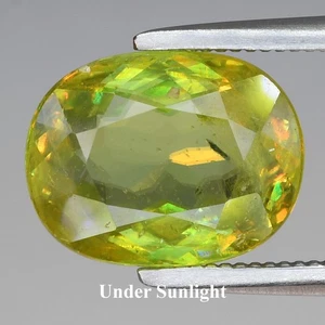 💎 2.47ct Oval Natural Yellowish Green Sphene - Adamantine Luster, Gemstone - Picture 1 of 5