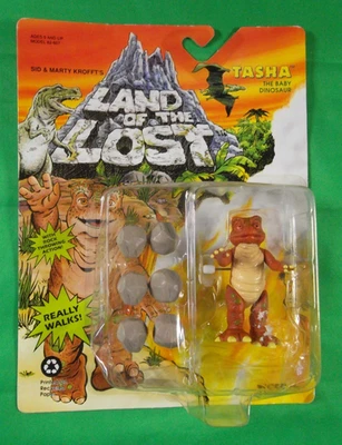 Tierra de los Perdidos Tasha Bebé Dinosaurio Figura De Colección Tigre Juguetes 1992 Lote Sellado A Foto 1 de 3