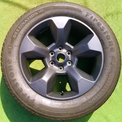 Factory Ram 1500 Wheel 99% Tire 20 in Black OEM 6FF70VXWAA 6FF70VCRAA 2675 2722 - Image 1 of 4