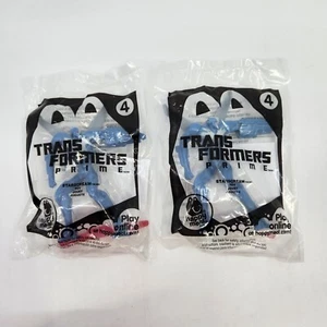 Lote de 2 juguetes Happy Meal 2013 McDonalds Transformers Prime #4 Starscream nuevo en paquete - Imagen 1 de 6