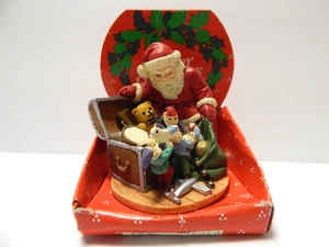 Weihnachtsmann Figur mit Truhe und Spielzeugsack - Bild 1 von 2
