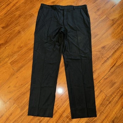 Pantalones de vestir de lana Armani Collezioni para hombre 38x32 negros lisos frente plano Foto 1 de 4